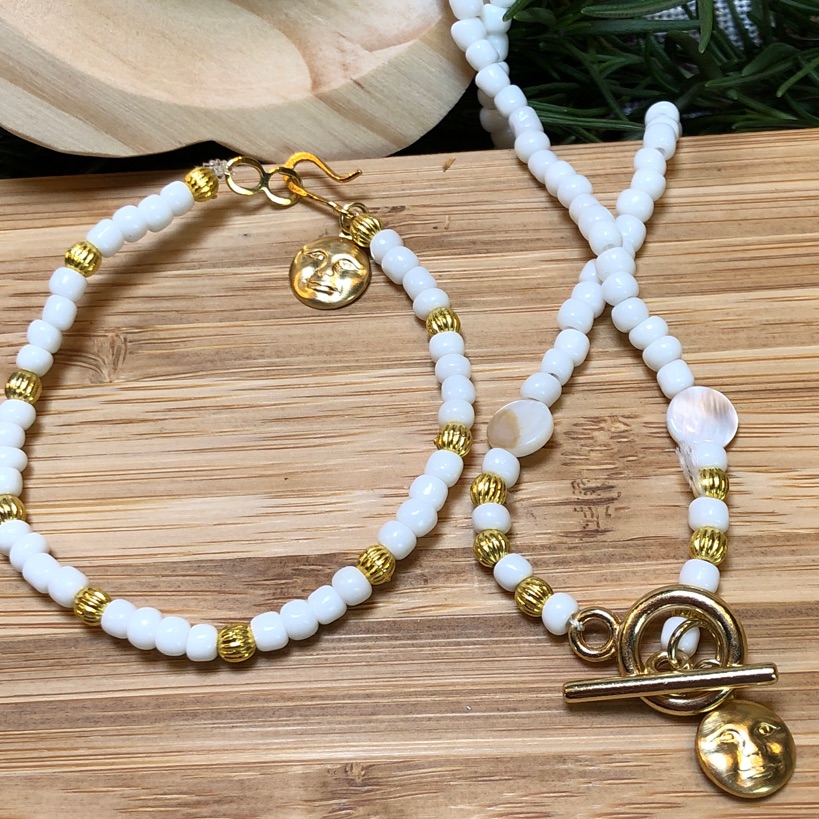 White And Gold Bracelet And Necklace